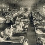 Soldados doentes com gripe espanhola em uma enfermaria do hospital no acampamento Funston em Fort Riley, Kansas. (Reprodução: Wikipedia)