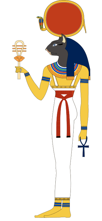 Bastet em sua forma tardia de mulher com cabeça de gato (em vez de leoa), segurando um ankh e um sistro. (Reprodução: Wikipedia)